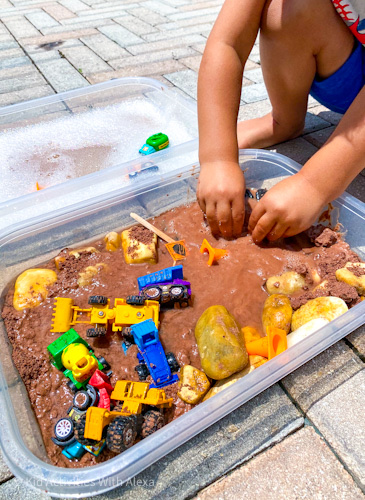 edible mud Construction themed sensory bin