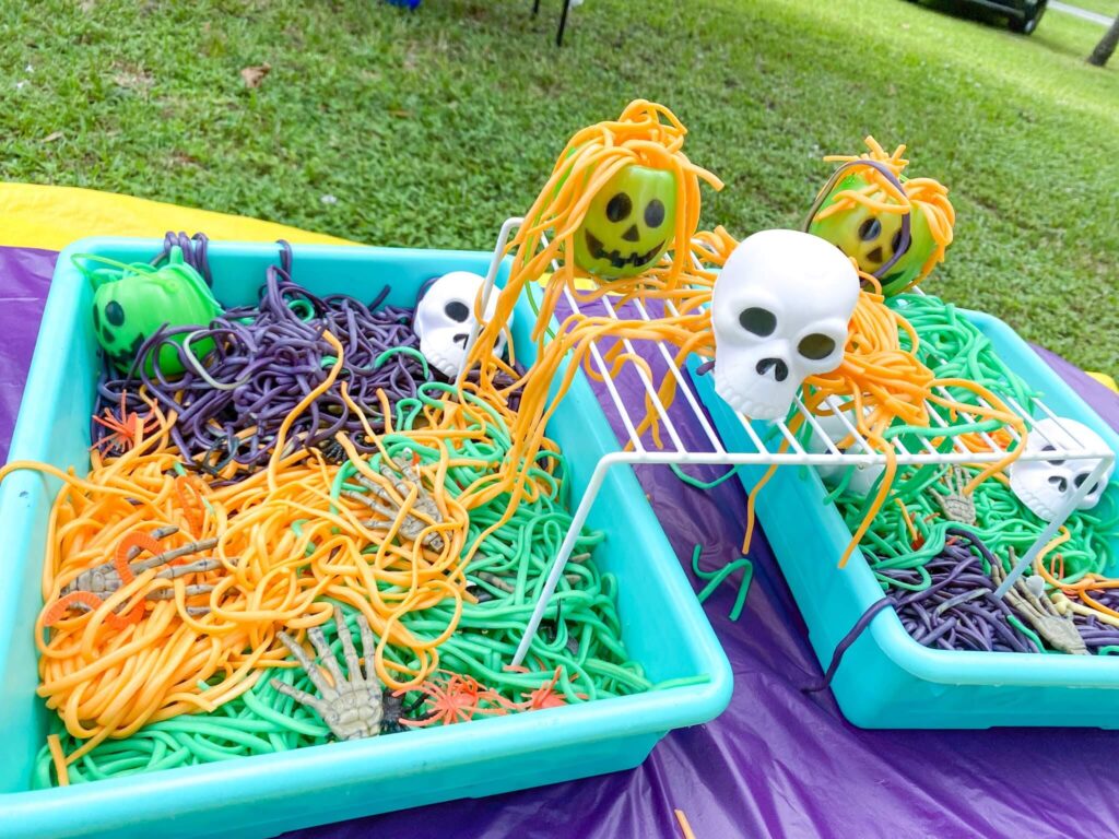 halloween sensory bin using spaghetti