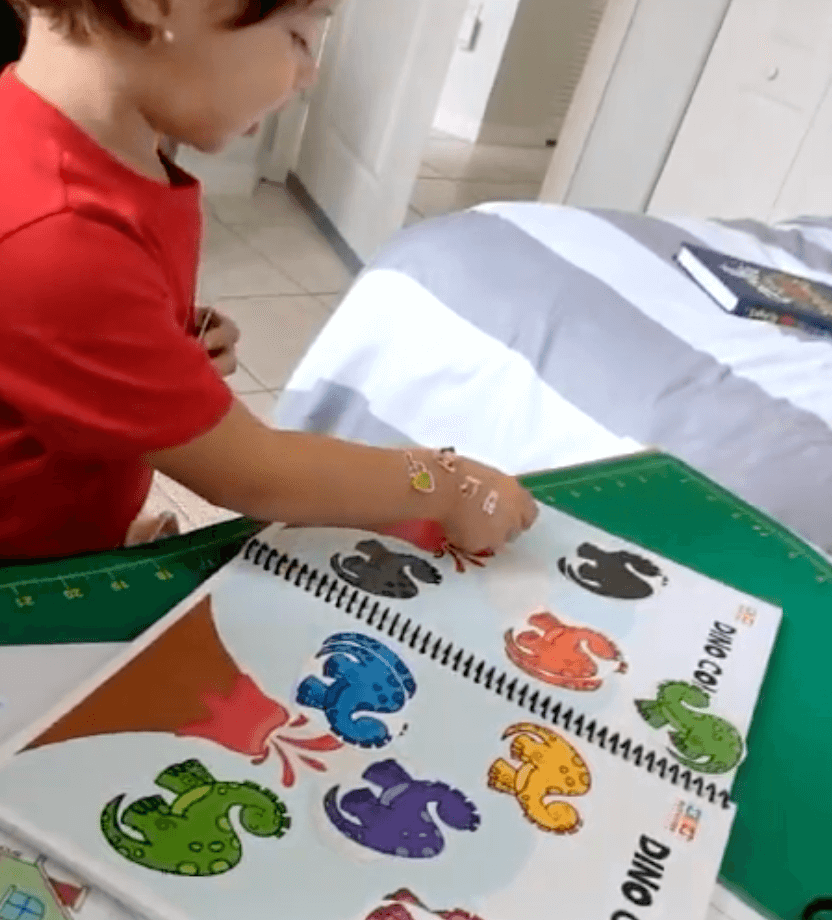 Child matching colors in the Level 3 binder